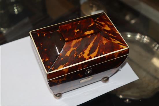 An early 19th century white metal mounted tortoiseshell sarcophagus tea caddy H.15cm, W.15cm